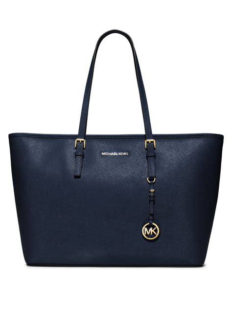 michael kors purses jet set travel|michael kors airplane design purse.